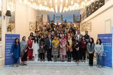 workshop attendees posed on stairs in a group photo