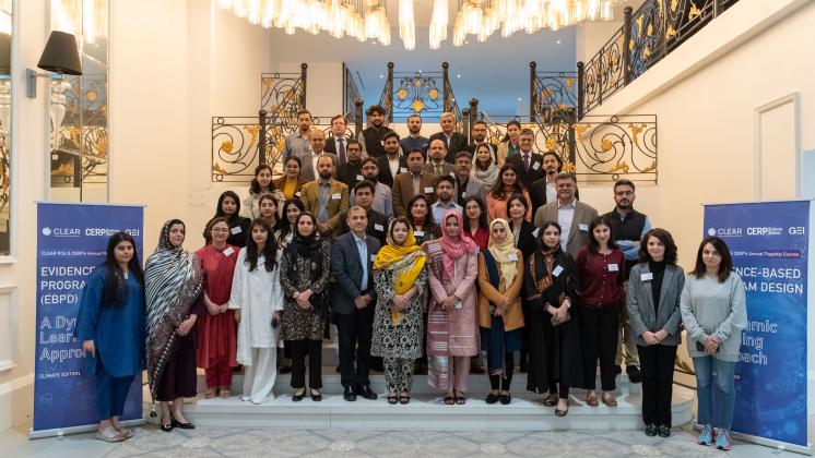 workshop attendees posed on stairs in a group photo